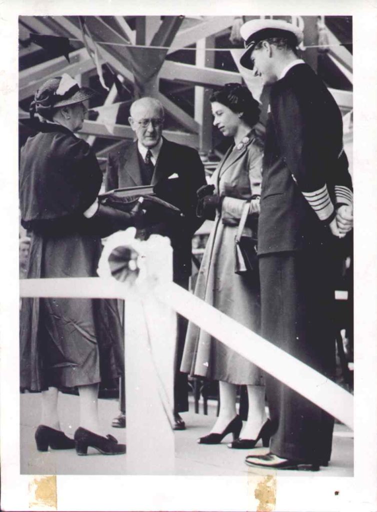 Photograph of Mrs Leslie presenting the book to Queen Elizabeth II in 1953