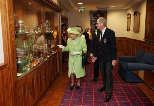 Photograph of Queen Elizabeth II visiting Royal Portrush Golf Club in 2016.
