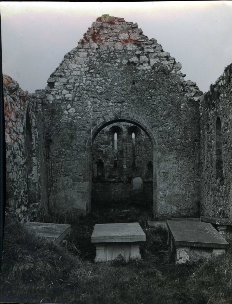 Photograph of the interior of Dungiven Priory. From the Sam Henry Collection.
