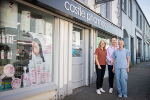 Staff of Castle Pharmacy outside the shop.